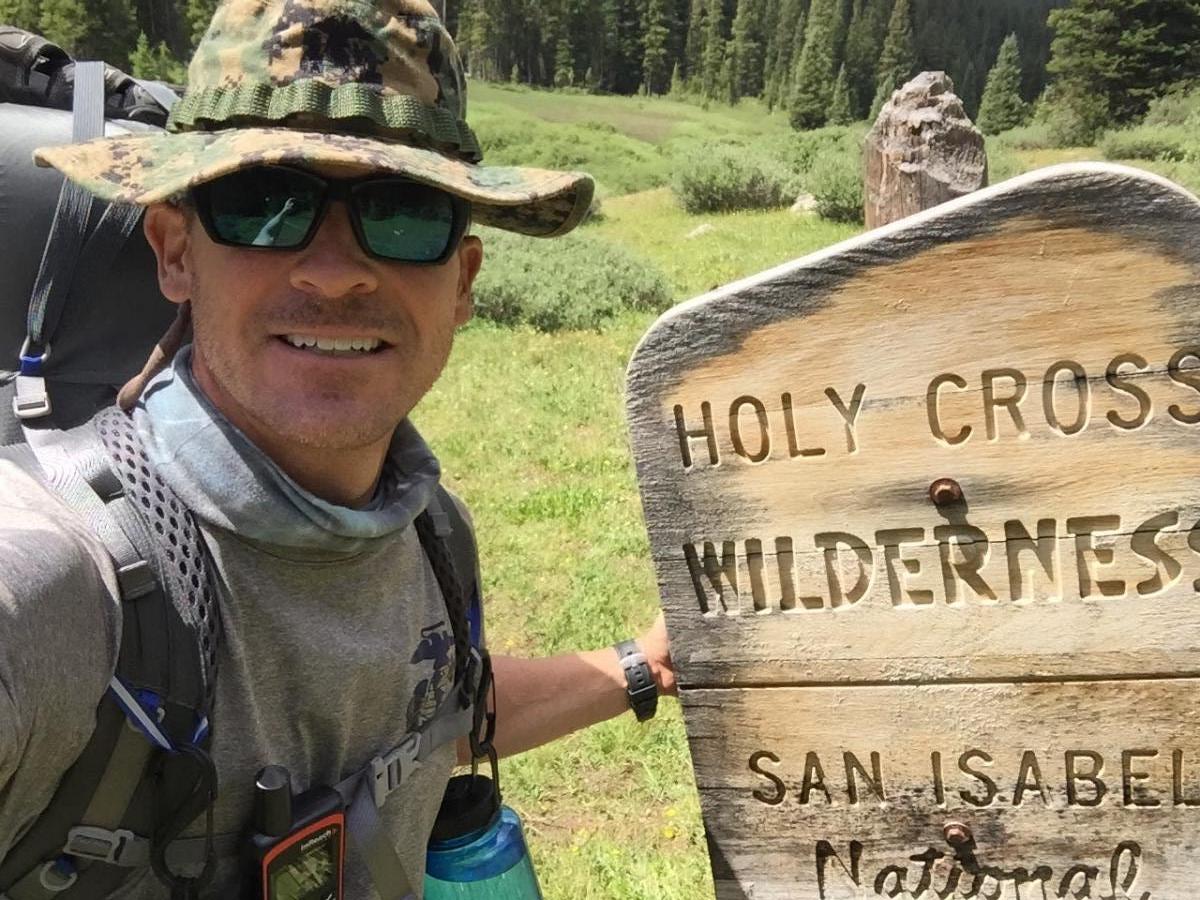 A selfie with the sign. The Holy Cross Wilderness has a special place in my heart because on August 16, 2015 (a day before my 40th birthday) I summited its Mount of the Holy Cross, my first "fourteener" (elevation 14,005 feet). Mount of the Holy Cross has the reputation of endangering the lives of many hikers (and claiming some of them), due to rapidly changing environmental conditions and confusion regarding the surrounding landscape. I did not make a return visit to the summit on this trip. 